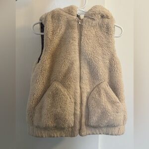 Zara faux fur vest with‎ a hood and zip closure